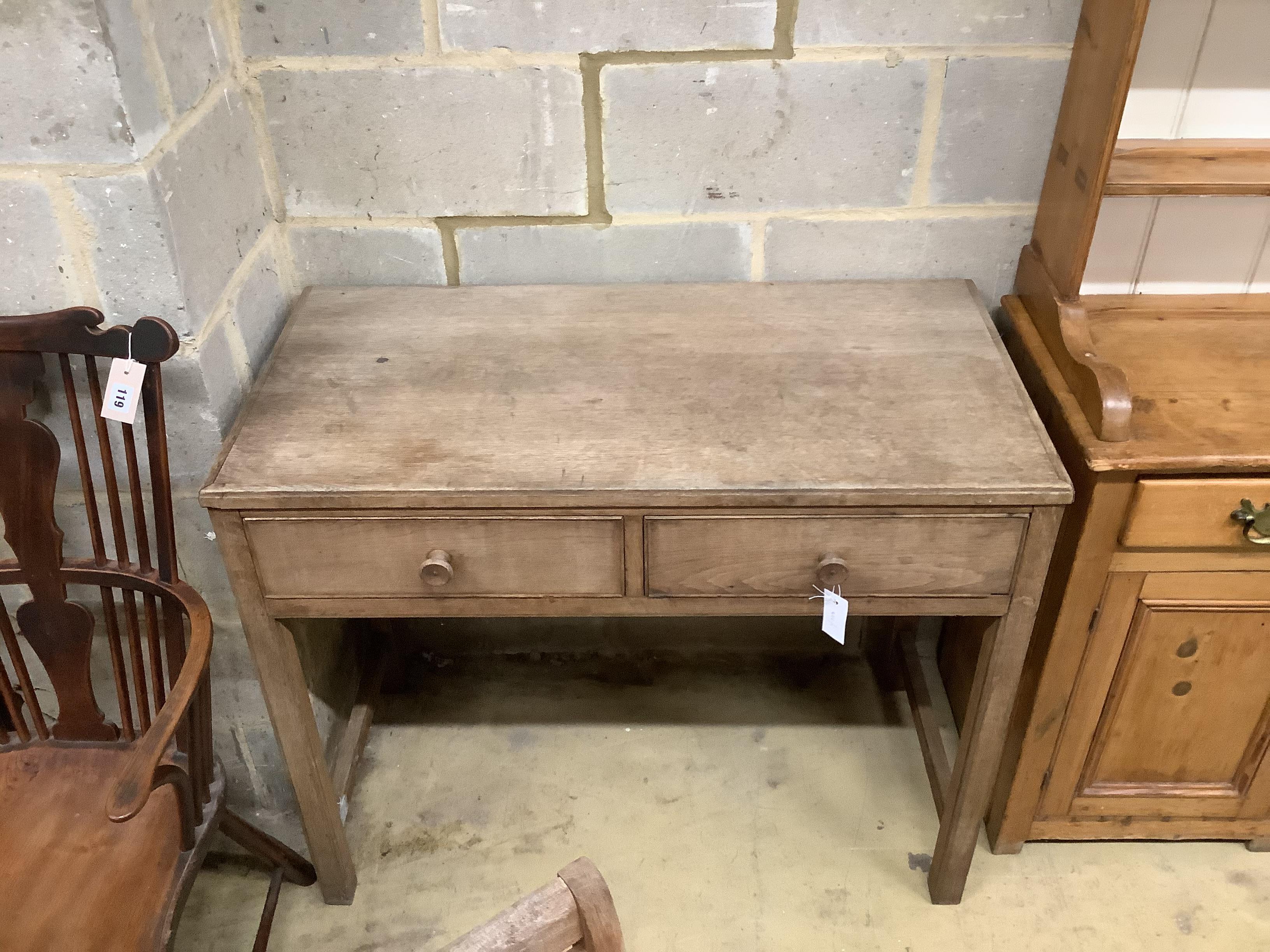 A Gordon Russell light oak two drawer side table, width 99cm, depth 50cm, height 82cm